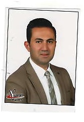 TEOMAN KÖMÜRCÜ